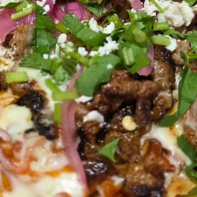 GRILLED GARLIC TOSTADAS.